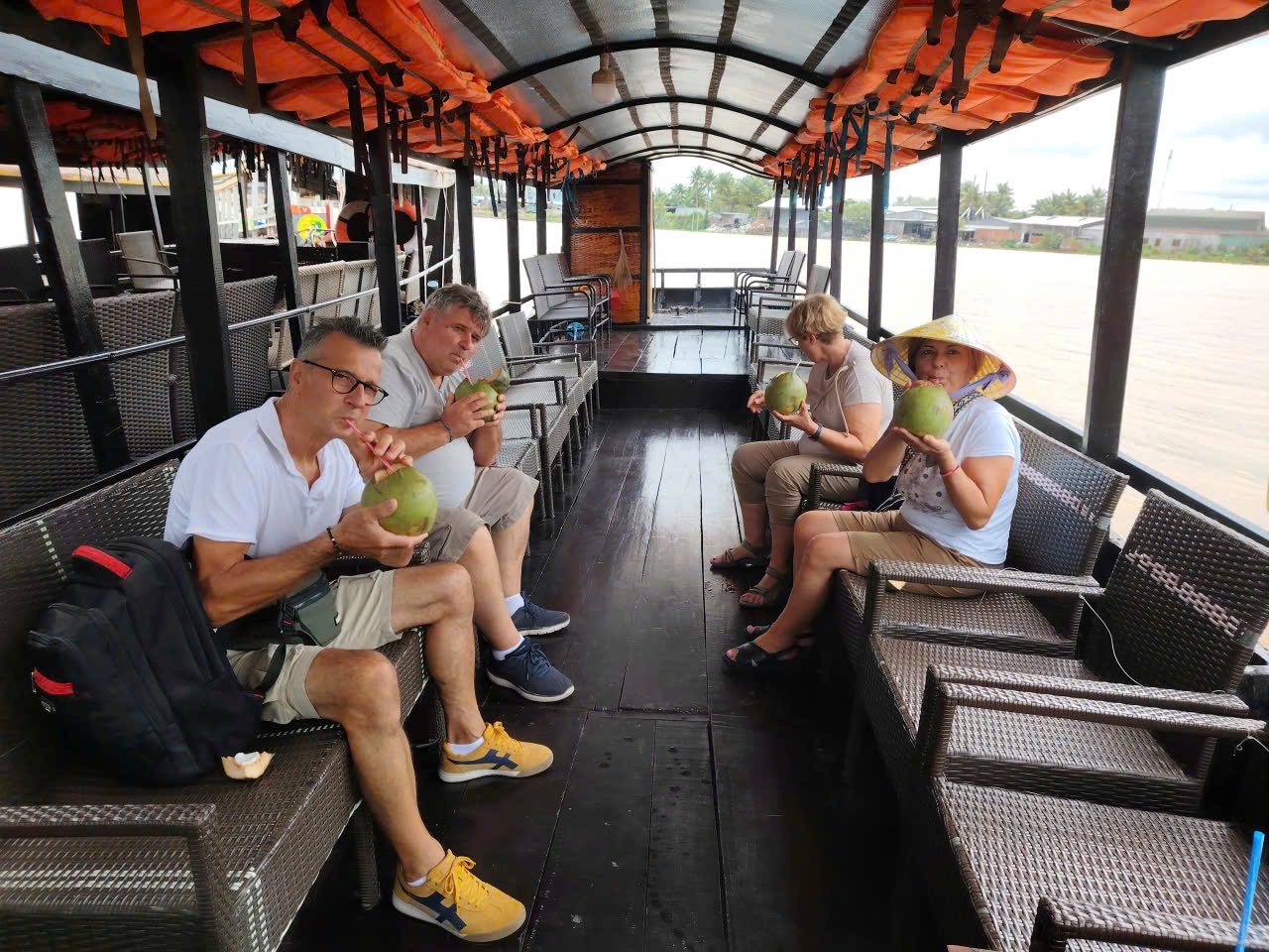 Tourists enjoy boat tours on the Mekong River amidst the scenic waterways of the Western region.