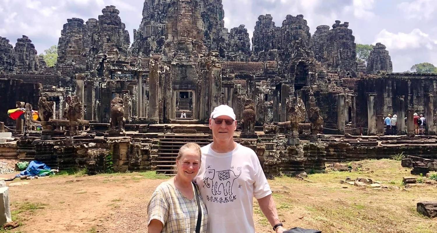Tourists check in at Siem Reap with its ancient scenery.