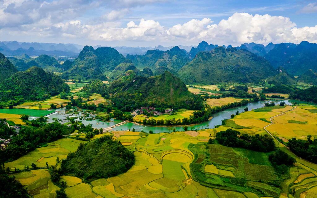 Northern Vietnam scenery with mountains, rice terraces, and misty valleys