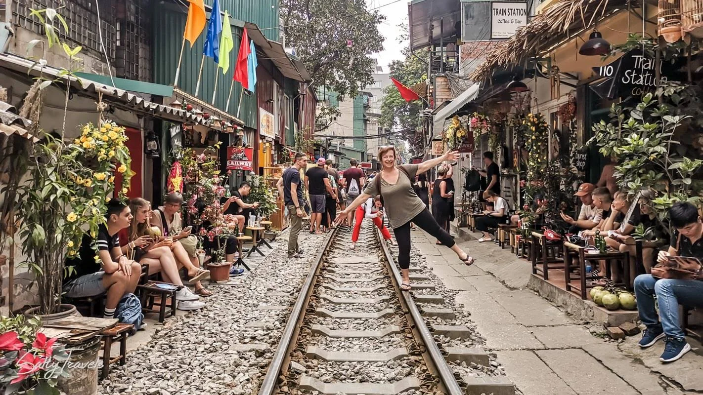Tourists check in at Hanoi's famous Railway Street.