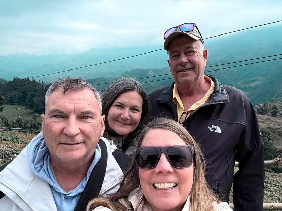 Travelers exploring the mountain landscapes and scenic views of Sapa during their Vietnam journey with Vietnam Asia Travel.