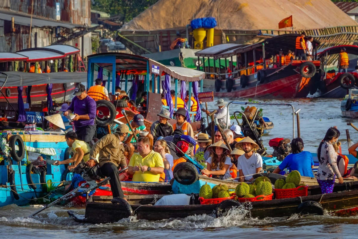 Wake up to Can Tho’s floating markets, peaceful waterways, tropical orchards, and authentic Mekong Delta life