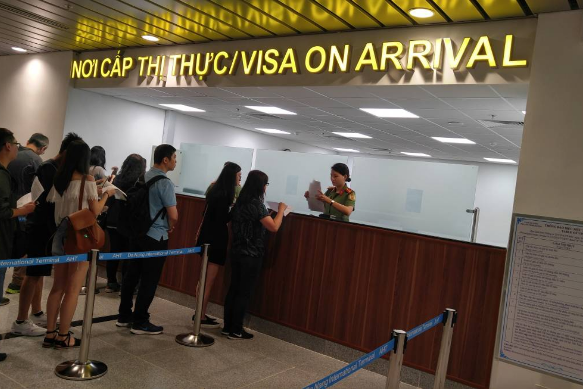 Complete the airport procedure, submit your documents, and pay the required visa fee before receiving your visa